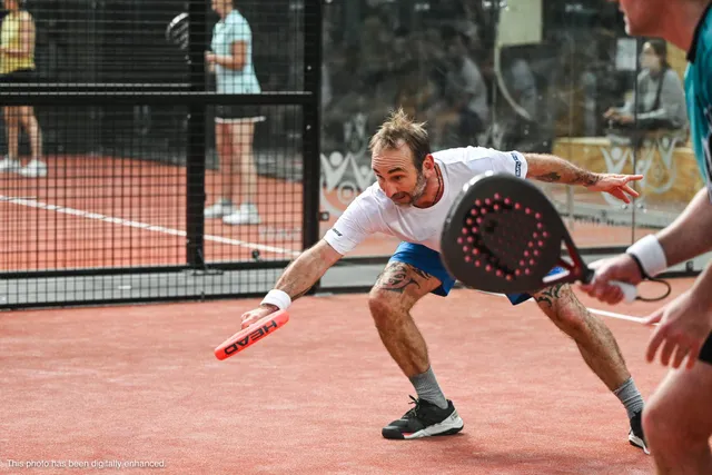 A player crouching to meet a low ball