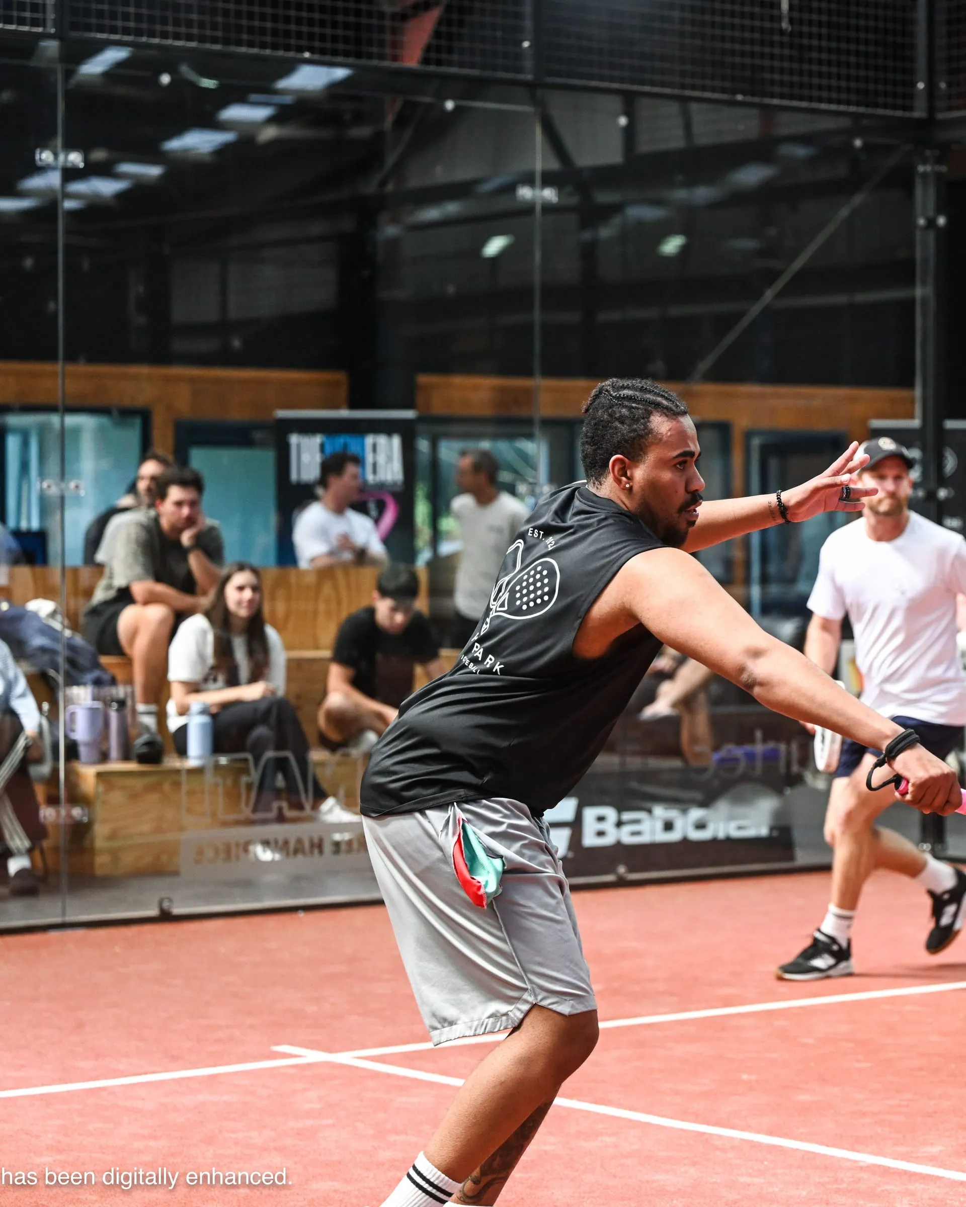 Ben, our head coach, stretching for a forehand