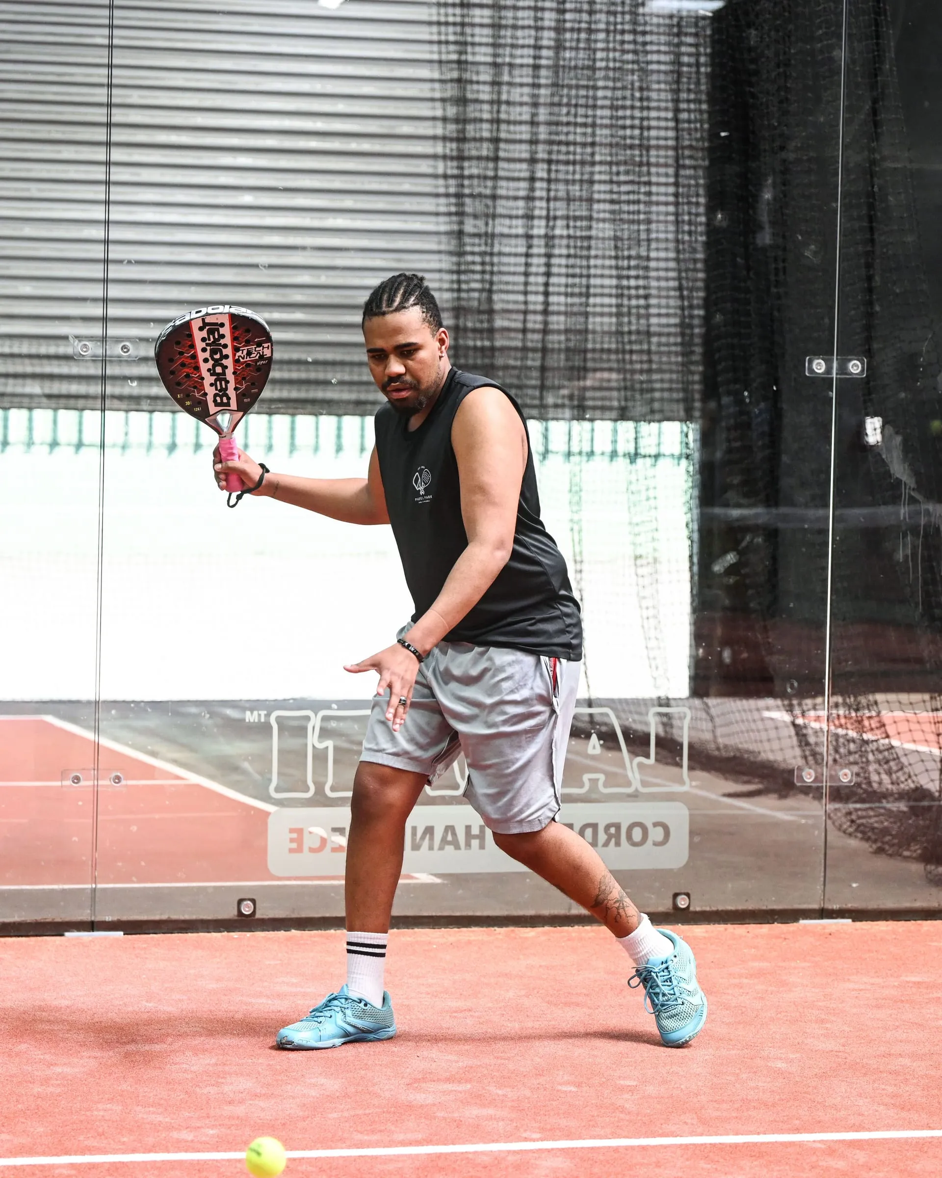 Ben, our head coach, winding up a forehand