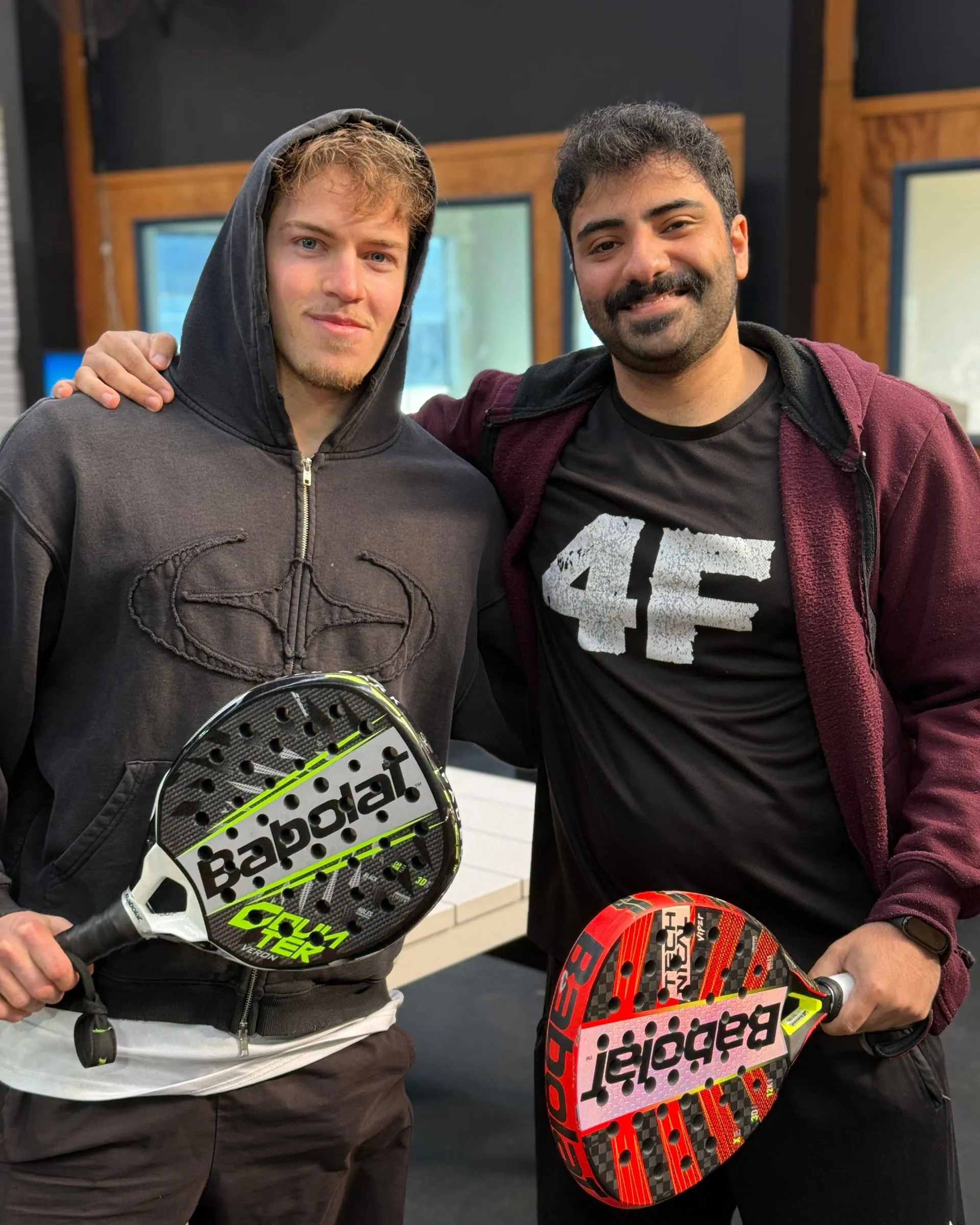 Jethro from the Park team with a friend, rackets in hand