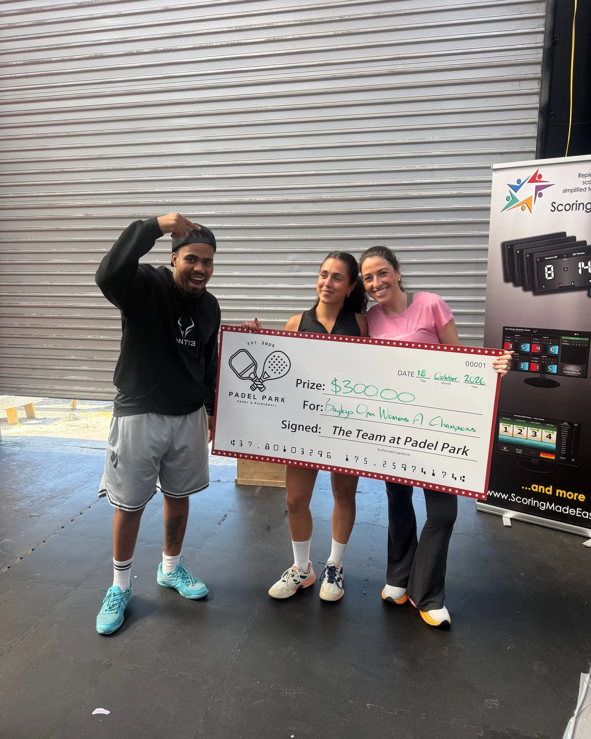 Ben, our head coach, celebrating with a prize cheque