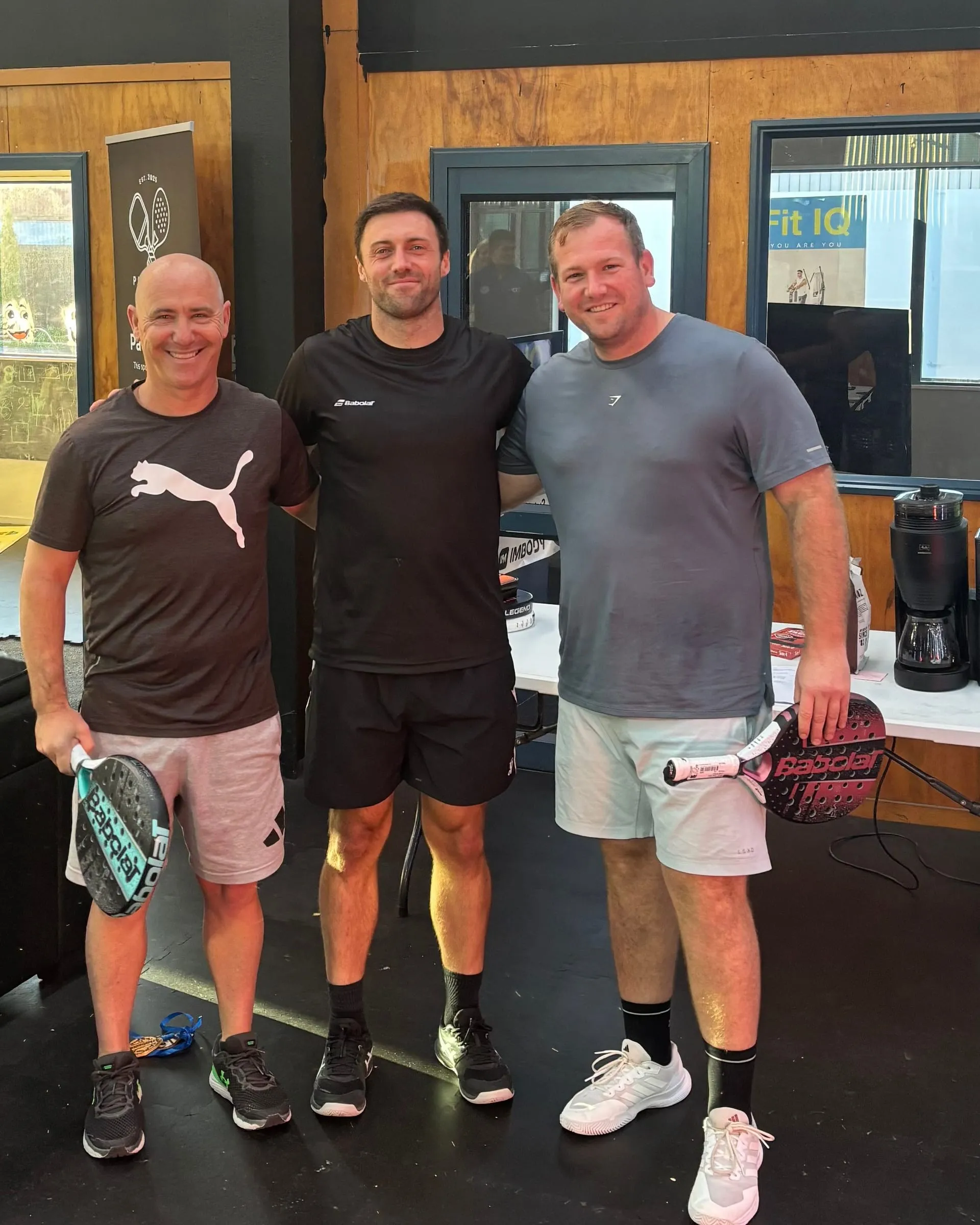 Three players with their rackets after a game at the Park